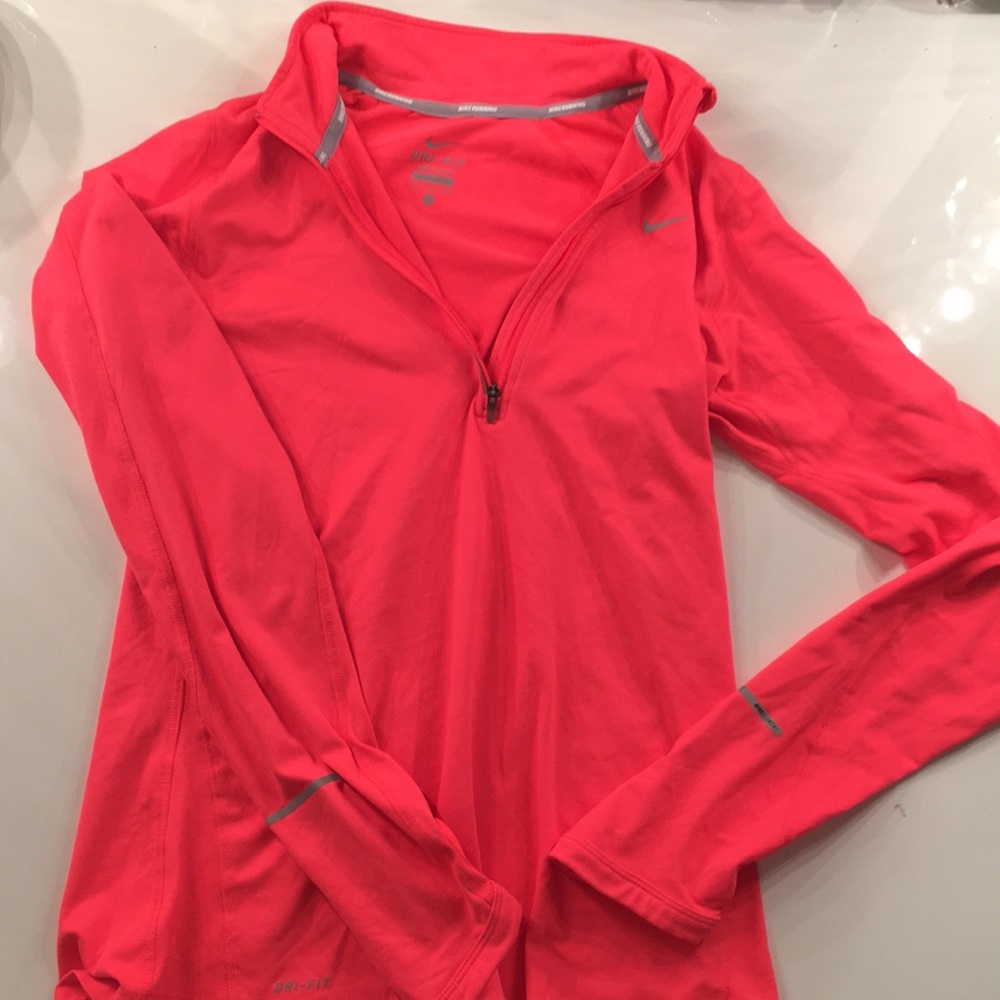 Bright pink Nike running jacket